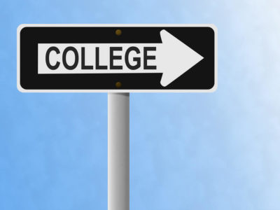 Road sign that reads College pointing to the right