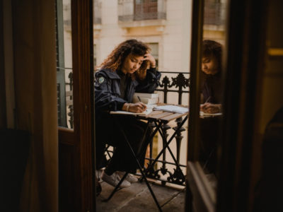 Woman on Terrace Writing