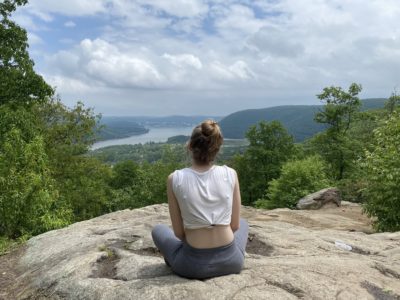 back view of me sitting on a mountain