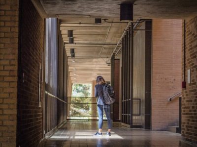 girl standing at ucla hallway