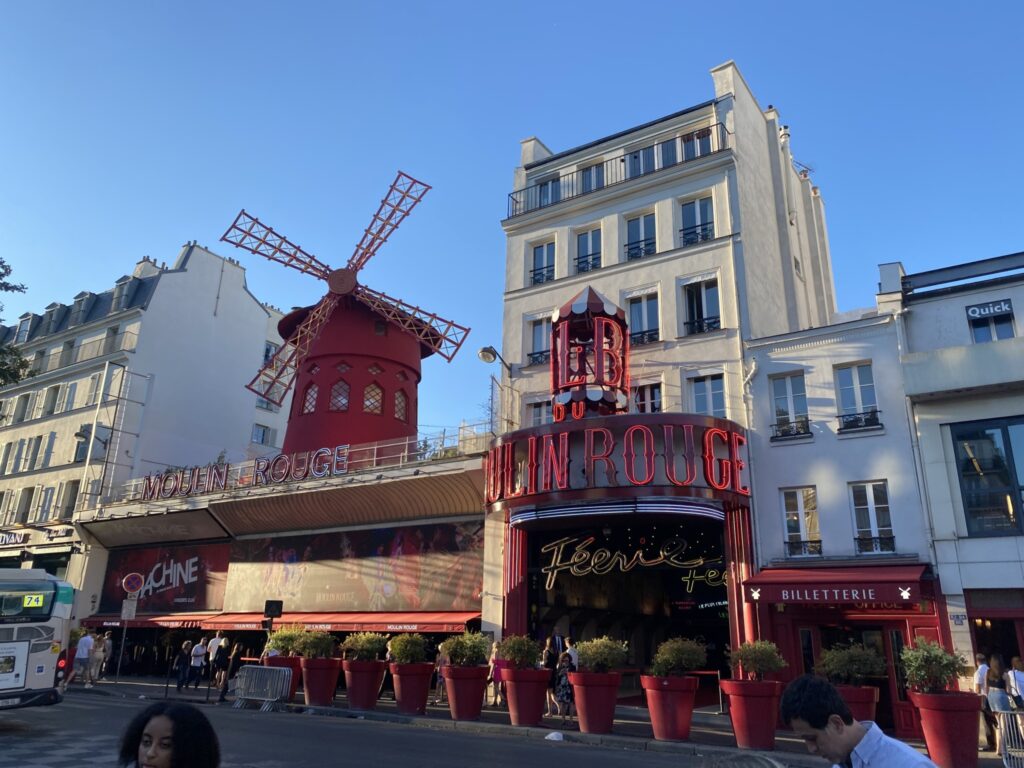 Photo of the exterior of the Moulin Rouge in Paris