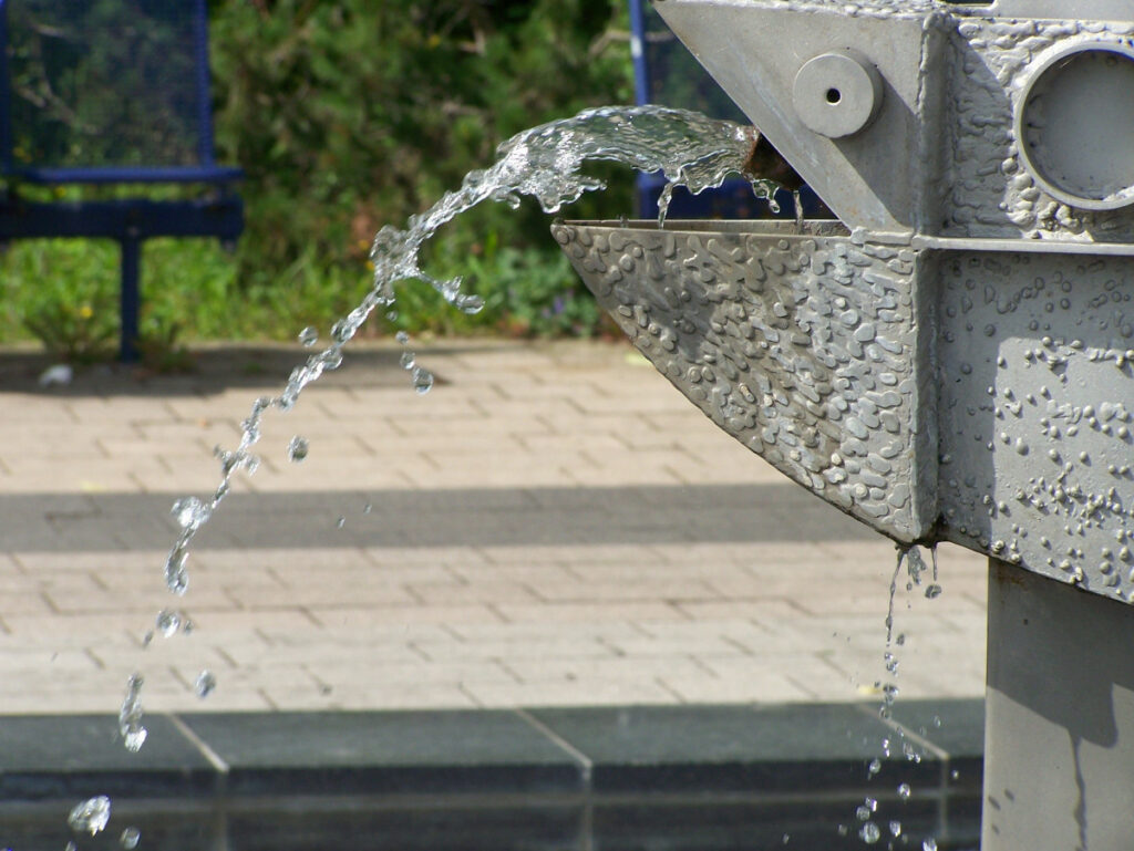 Photo of a gargoyle water fountain in Paris